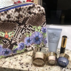 Estée Lauder cosmetic bag and makeup